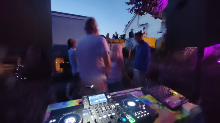 Cosmic Turtle Djing at birthday under a blue sky, 2025